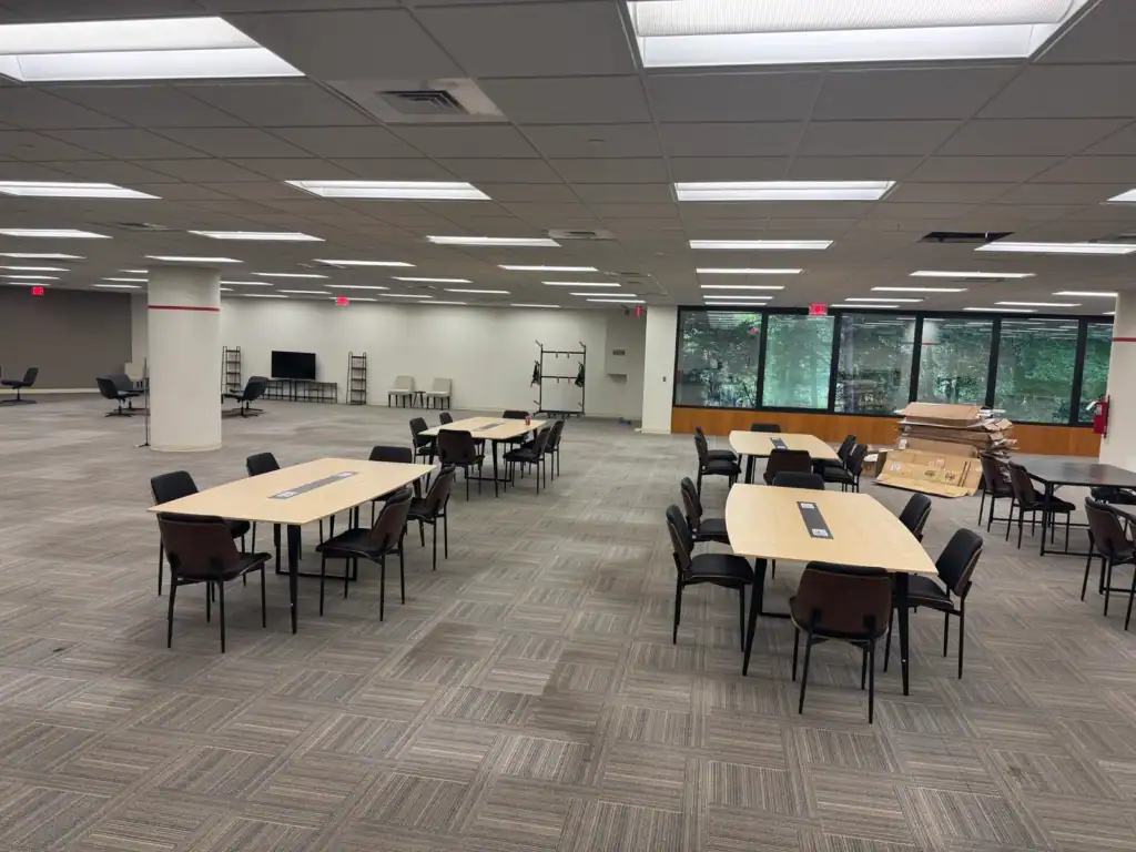 Shared work tables and seating in the Tributary coworking area